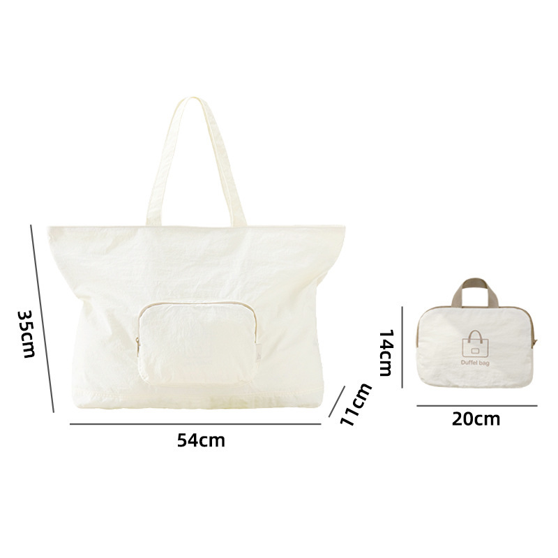 Dimensions of packable nylon duffel bag, 54x35x11 cm expanded, folds into 20x14 cm pouch
